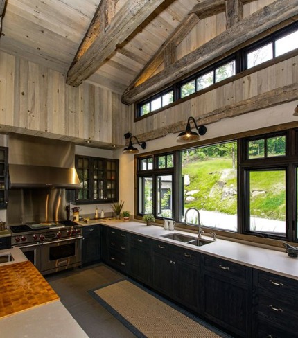 Image of a kitchen with new black modern windows.