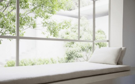 sitting bench by large window